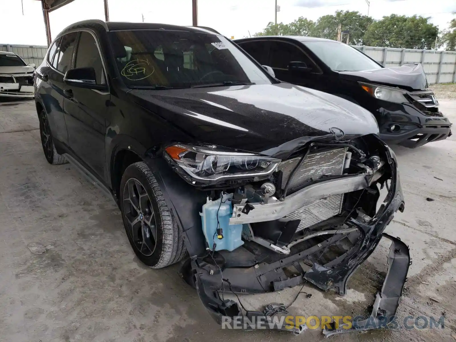 1 Photograph of a damaged car WBXHU7C58K5L11546 BMW X1 2019