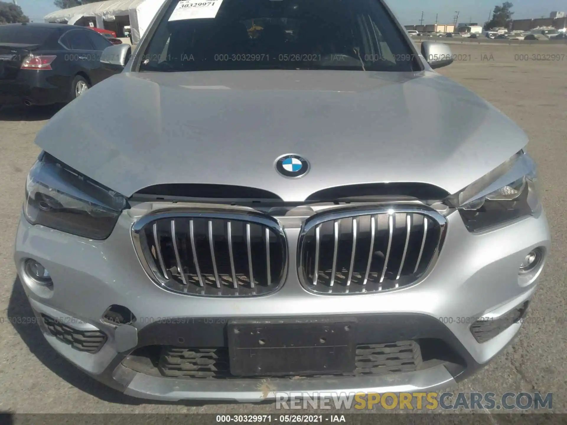 6 Photograph of a damaged car WBXHU7C59K3H46137 BMW X1 2019