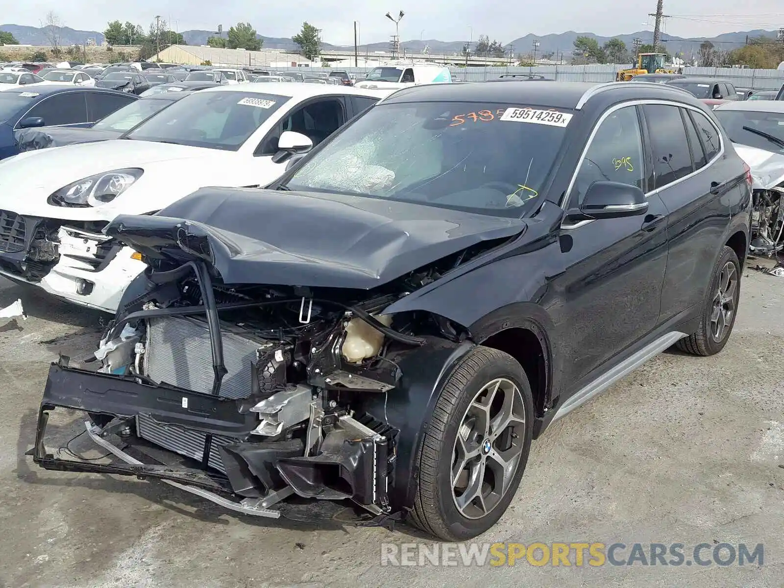 2 Photograph of a damaged car WBXHU7C59K5L12186 BMW X1 2019