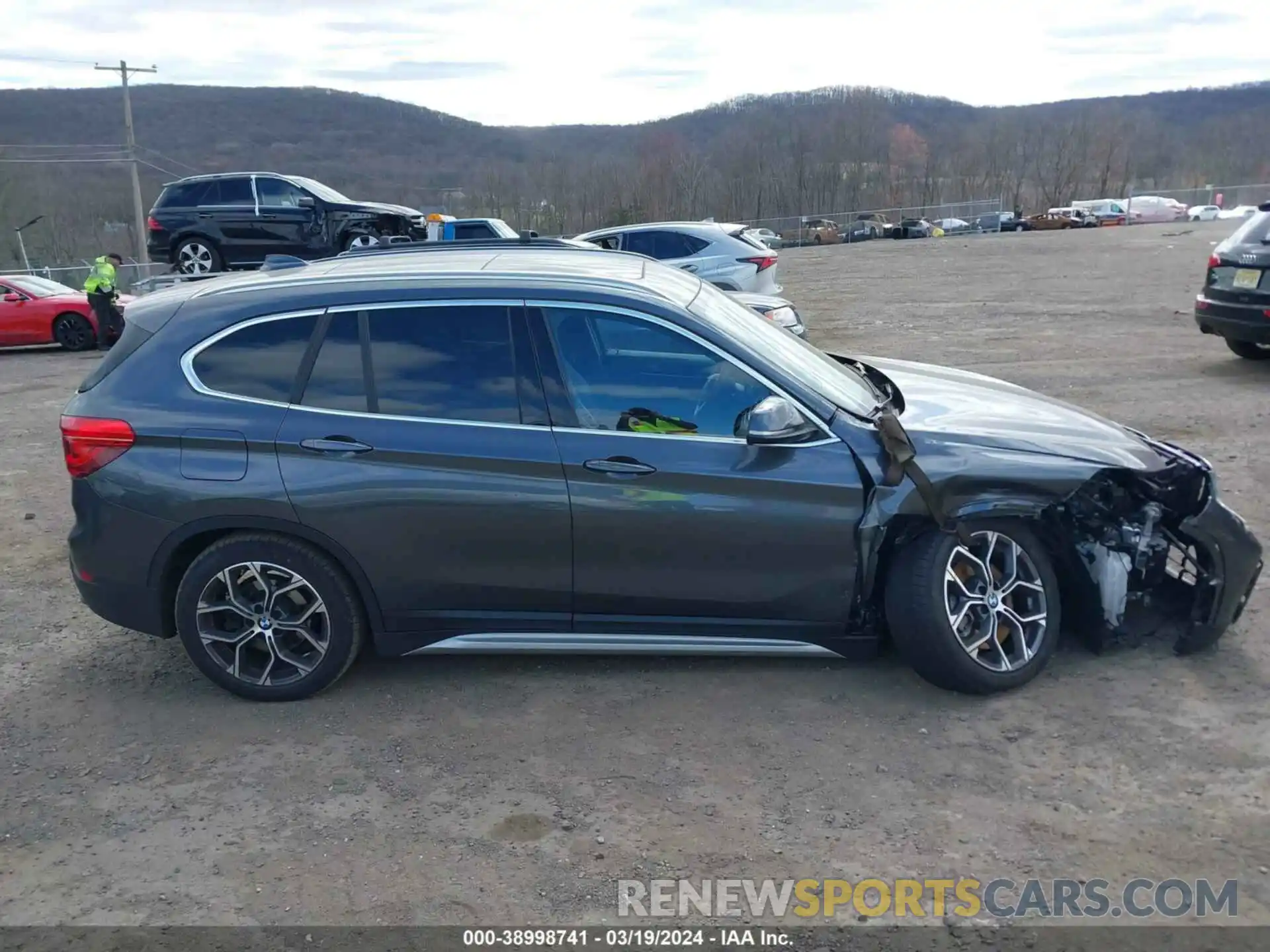 14 Photograph of a damaged car WBXJG7C01L5P49632 BMW X1 2020