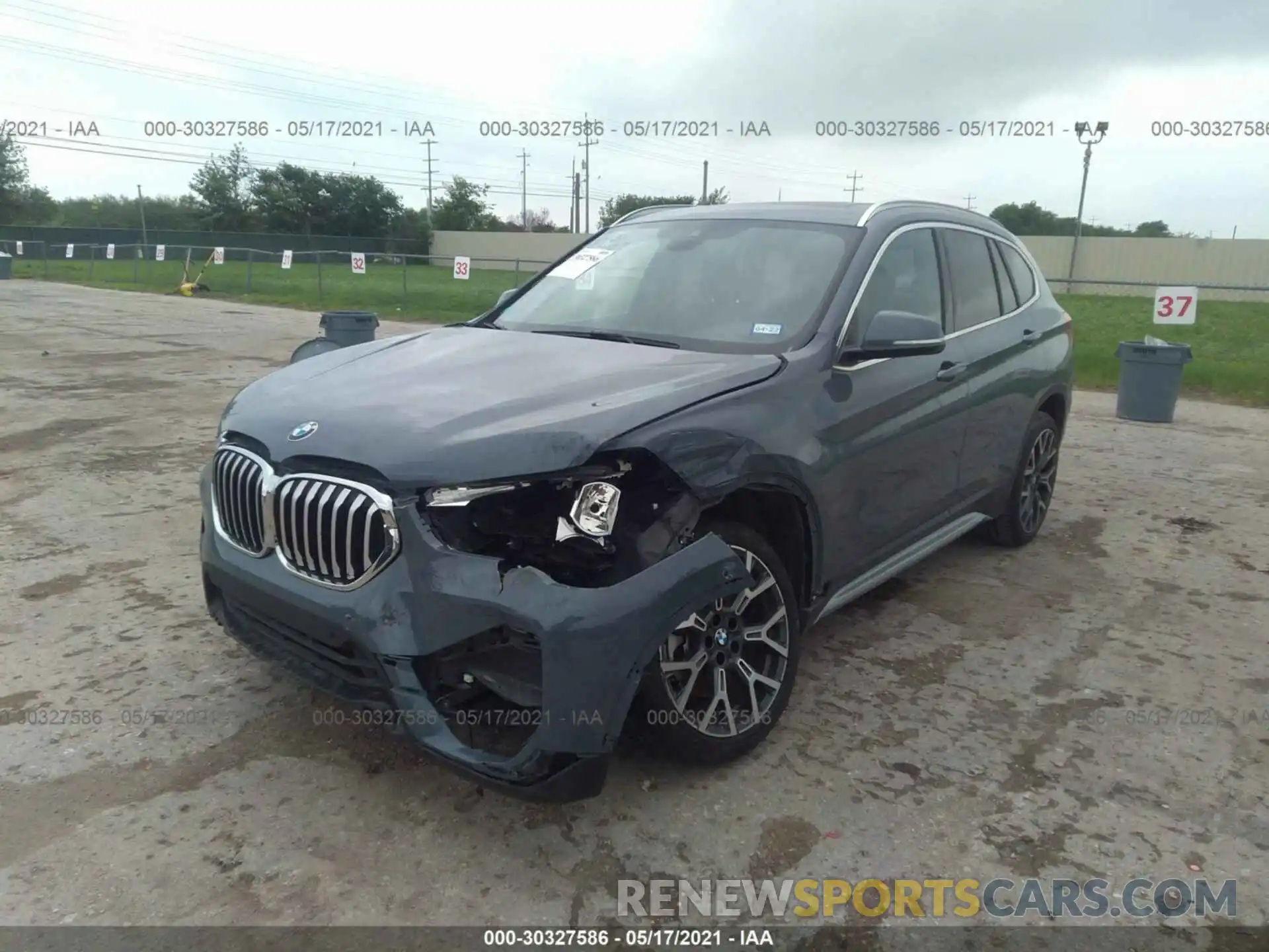 6 Photograph of a damaged car WBXJG7C01L5P98720 BMW X1 2020