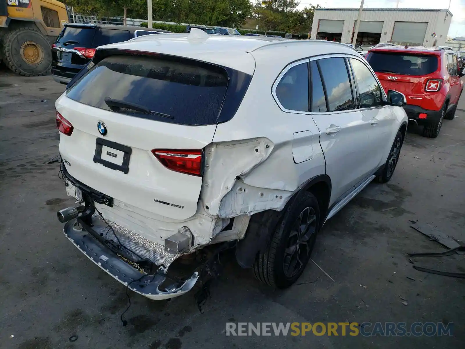 4 Photograph of a damaged car WBXJG7C09L5P31346 BMW X1 2020