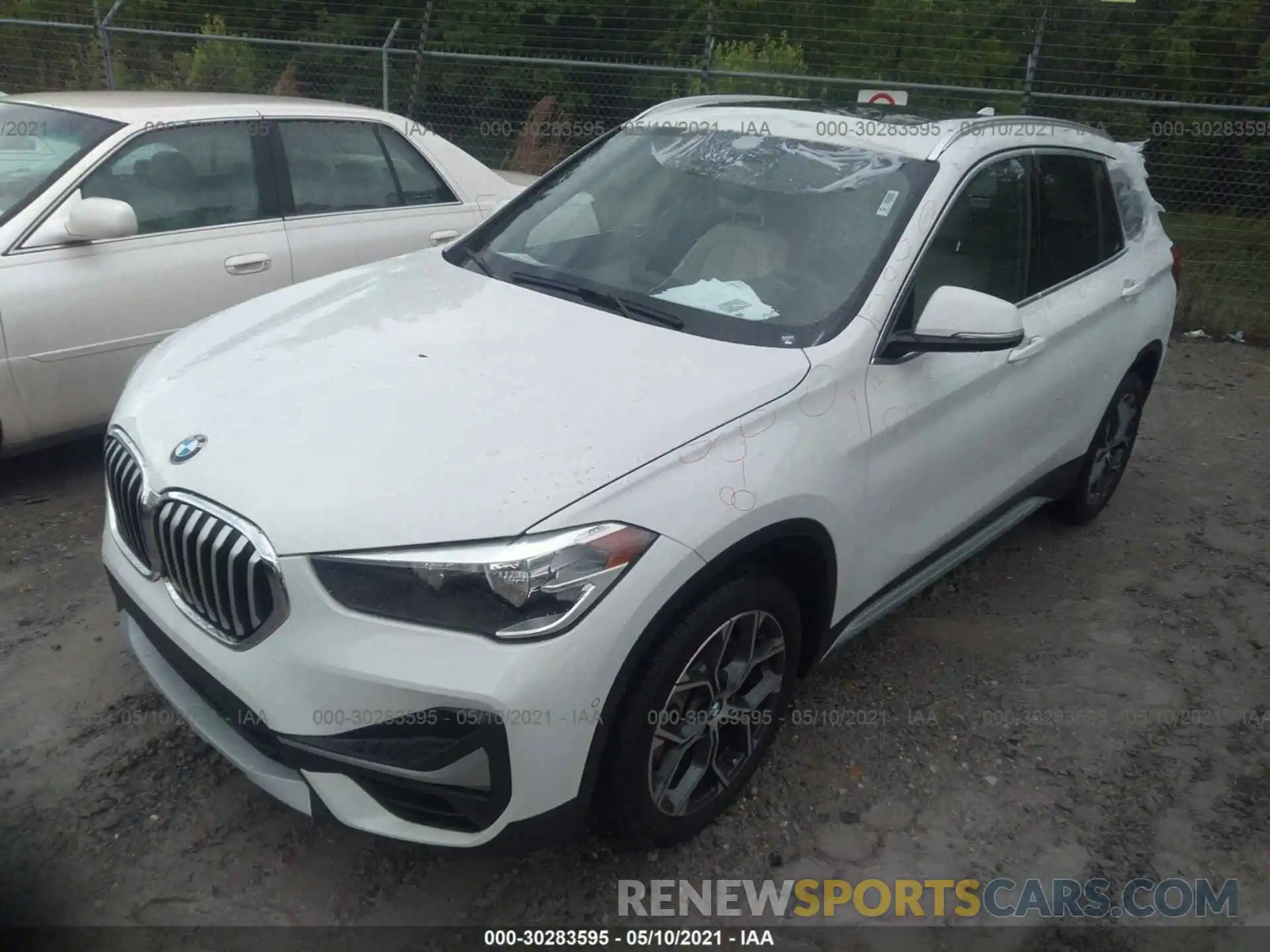 2 Photograph of a damaged car WBXJG7C0XL5R27926 BMW X1 2020