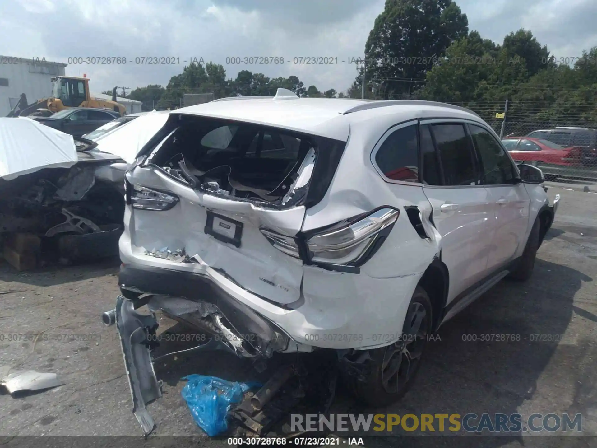 4 Photograph of a damaged car WBXJG7C00M5S17709 BMW X1 2021