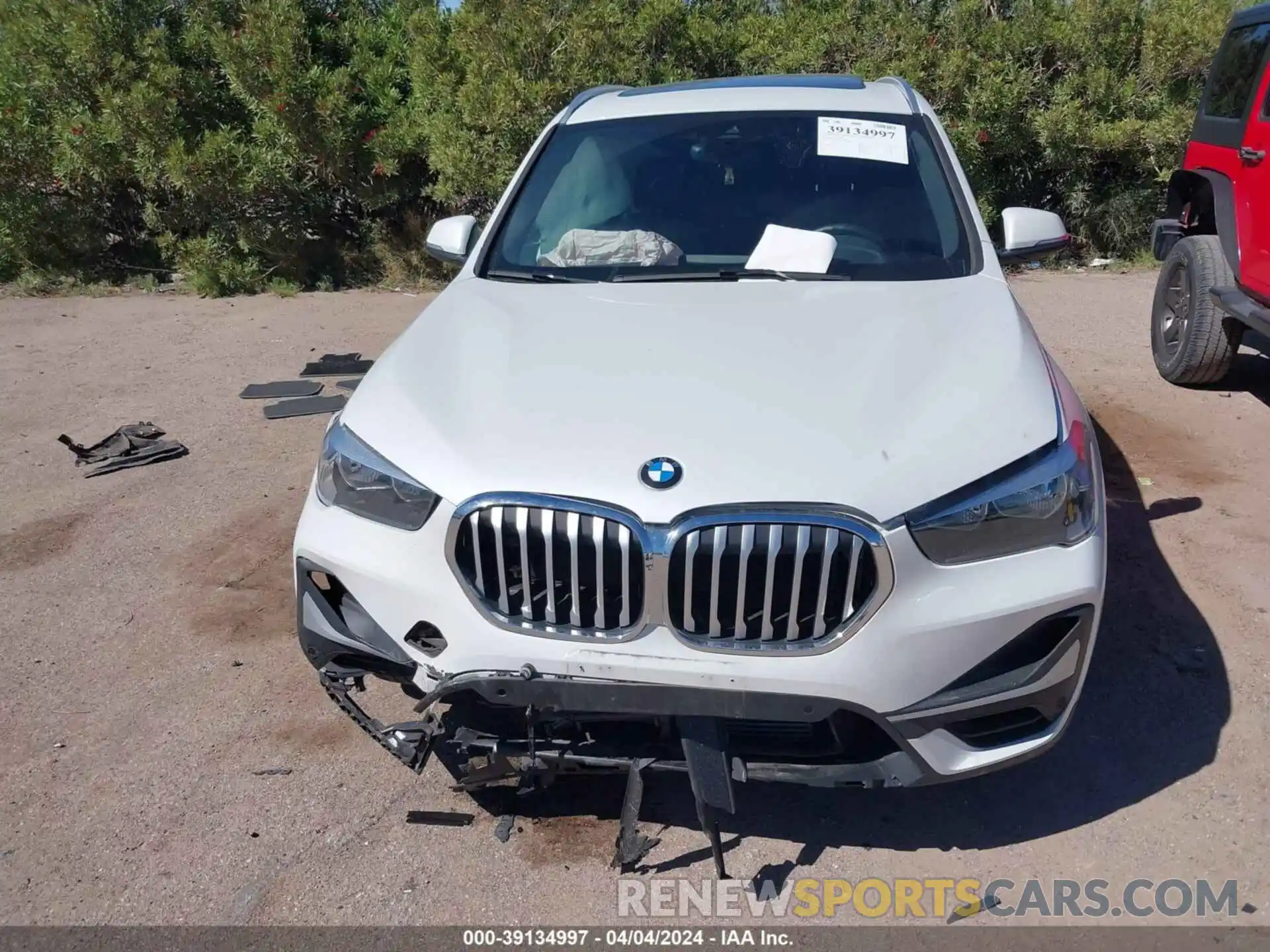 12 Photograph of a damaged car WBXJG7C00M5U25847 BMW X1 2021