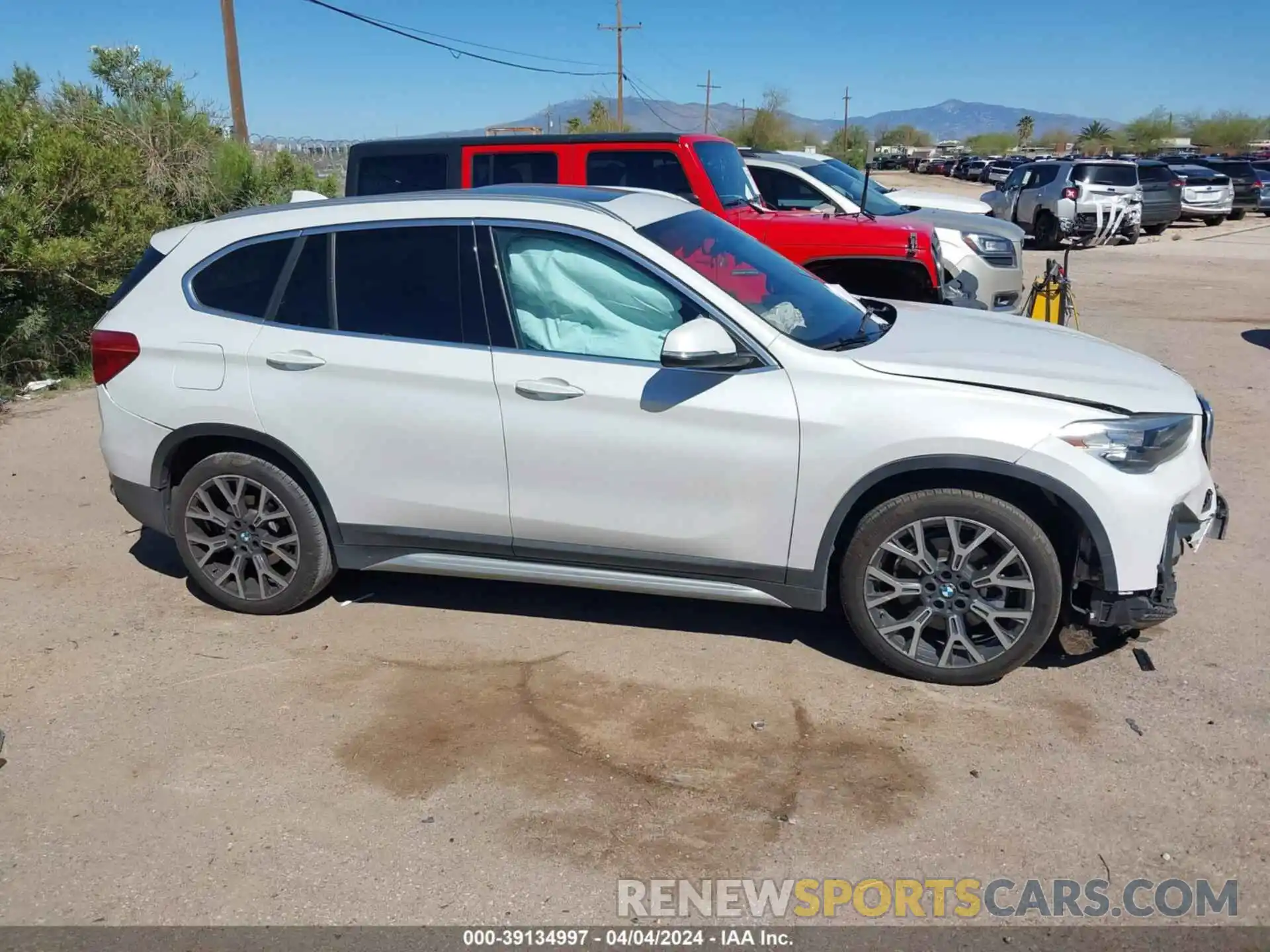 13 Photograph of a damaged car WBXJG7C00M5U25847 BMW X1 2021