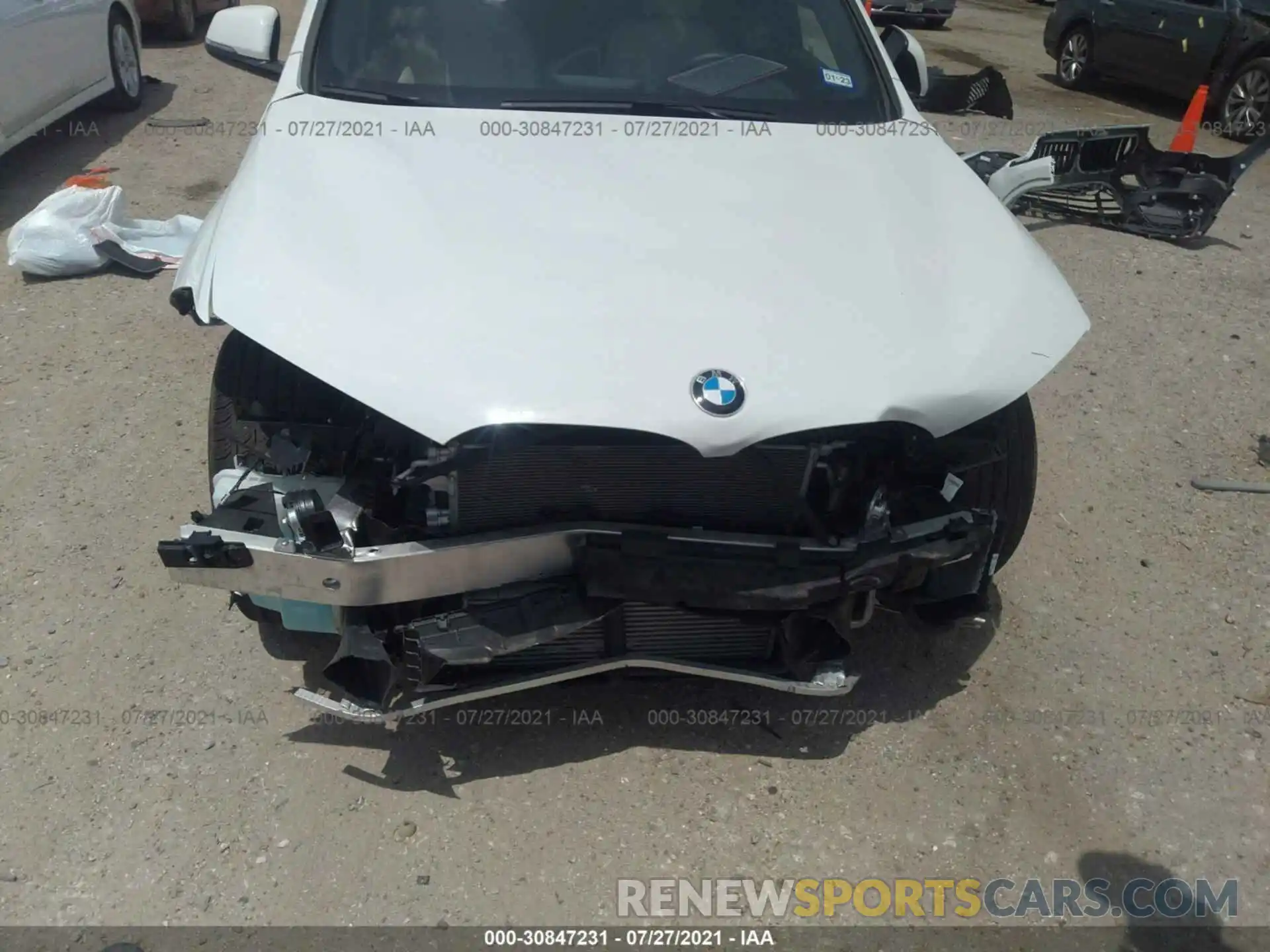 6 Photograph of a damaged car WBXJG7C03M5S01679 BMW X1 2021