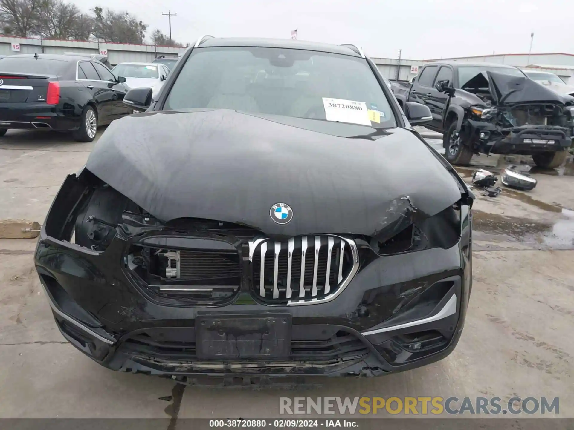 13 Photograph of a damaged car WBXJG7C05M5T77083 BMW X1 2021