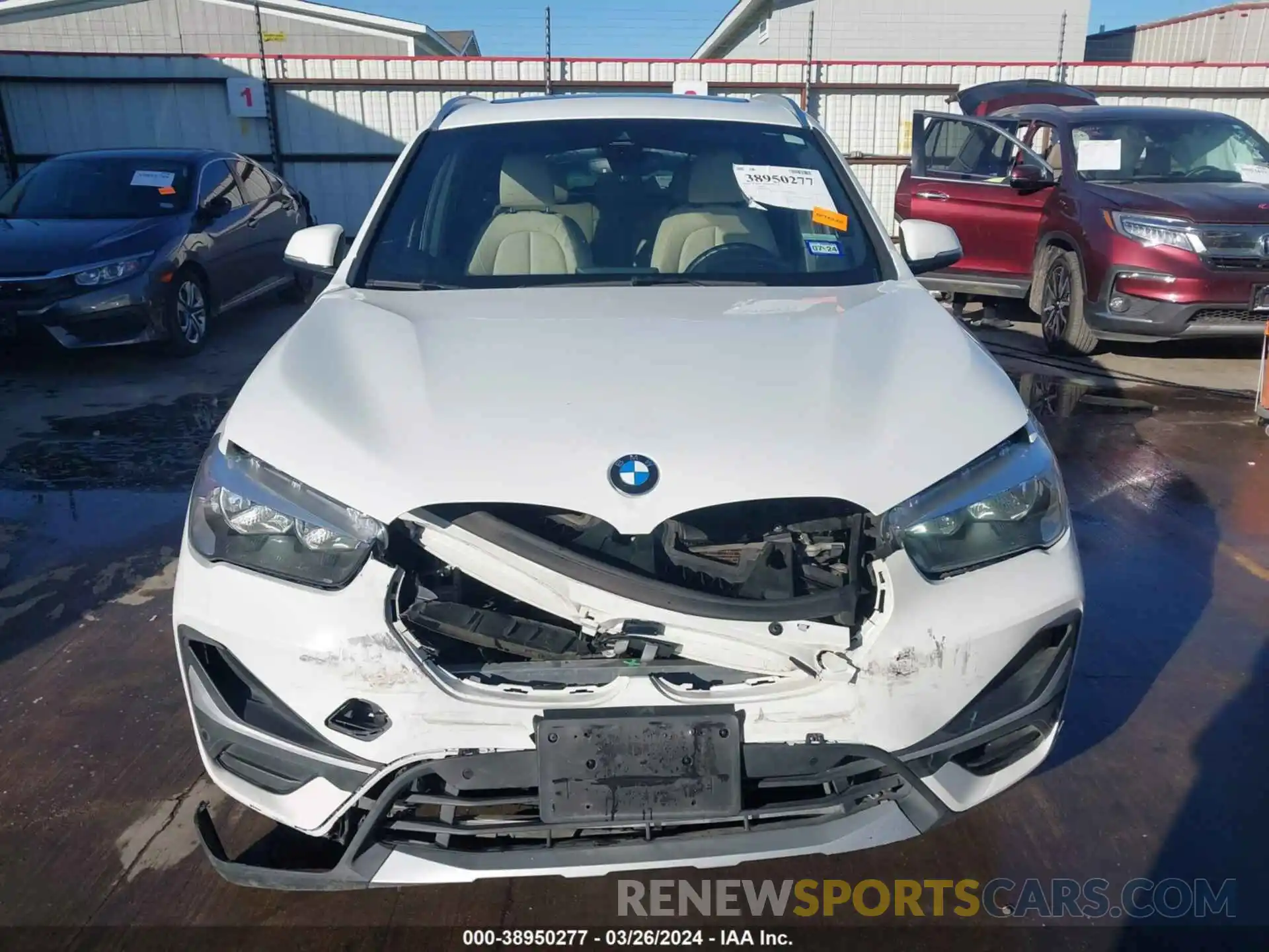 12 Photograph of a damaged car WBXJG7C09M5S95745 BMW X1 2021