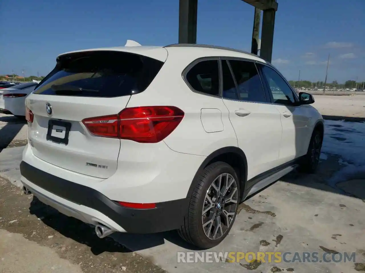 4 Photograph of a damaged car WBXJG7C0XM5T59047 BMW X1 2021