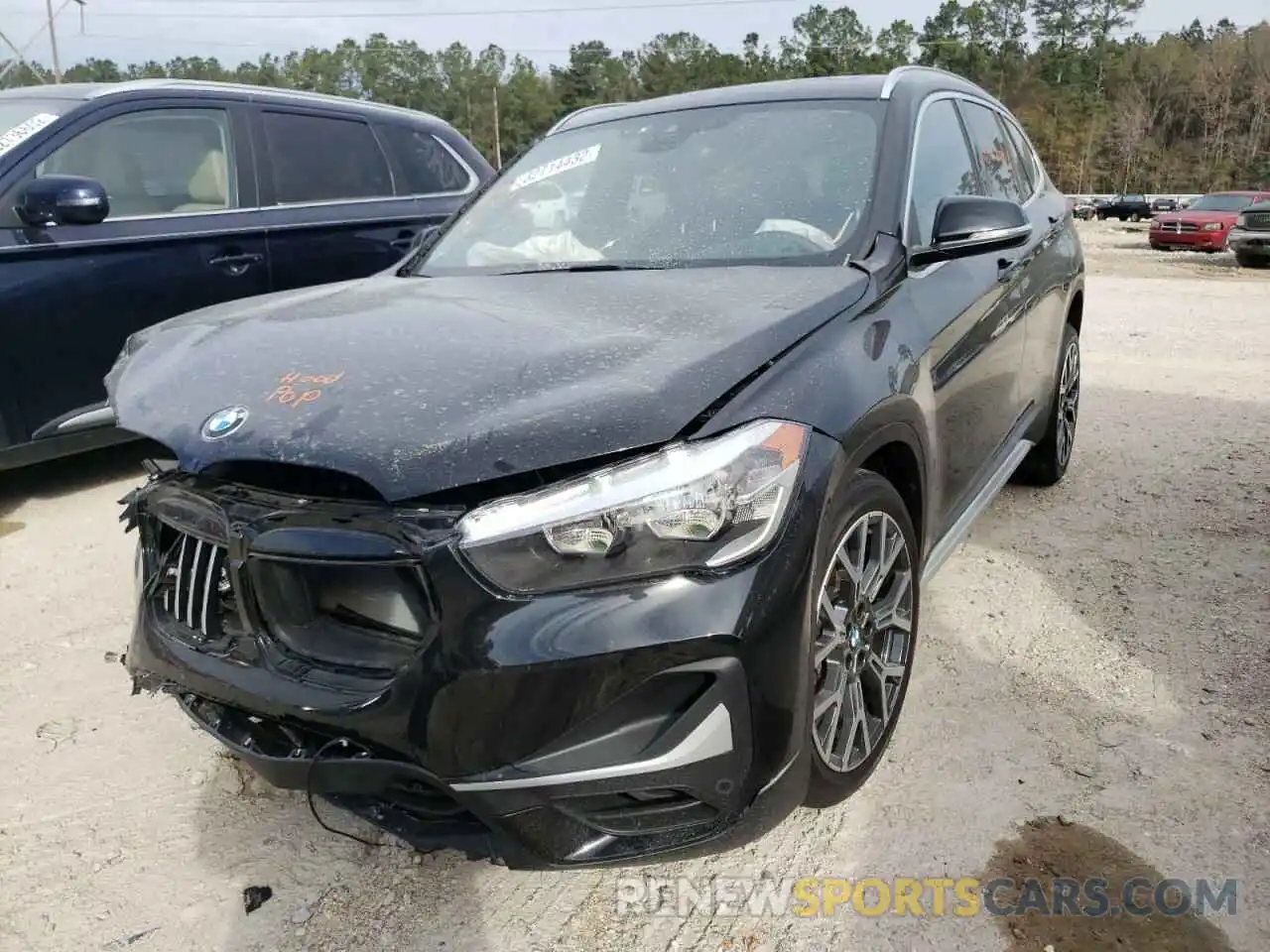 2 Photograph of a damaged car WBXJG7C0XM5U18453 BMW X1 2021