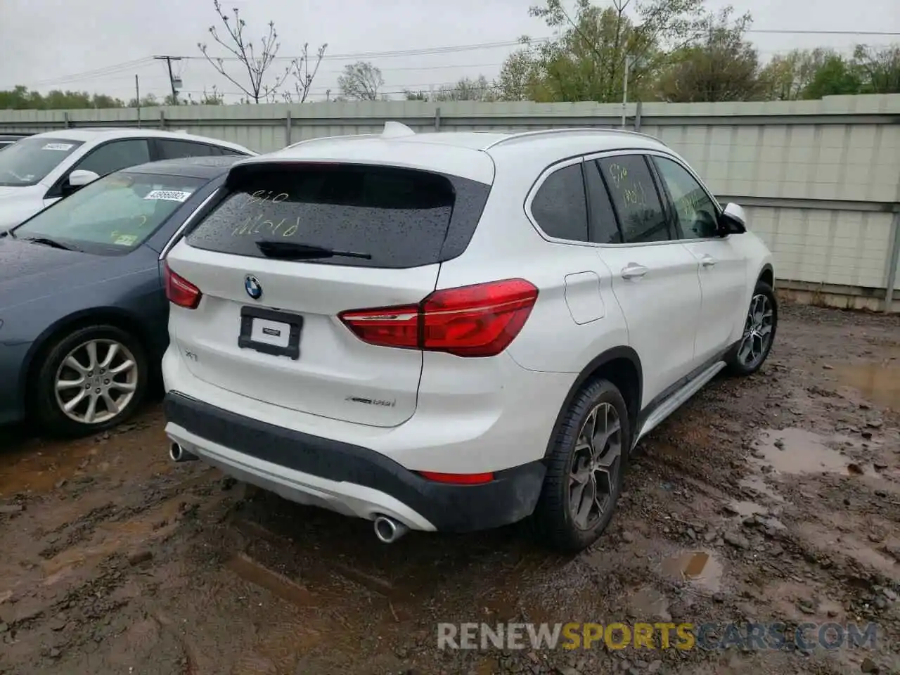 4 Photograph of a damaged car WBXJG9C01M5T61877 BMW X1 2021