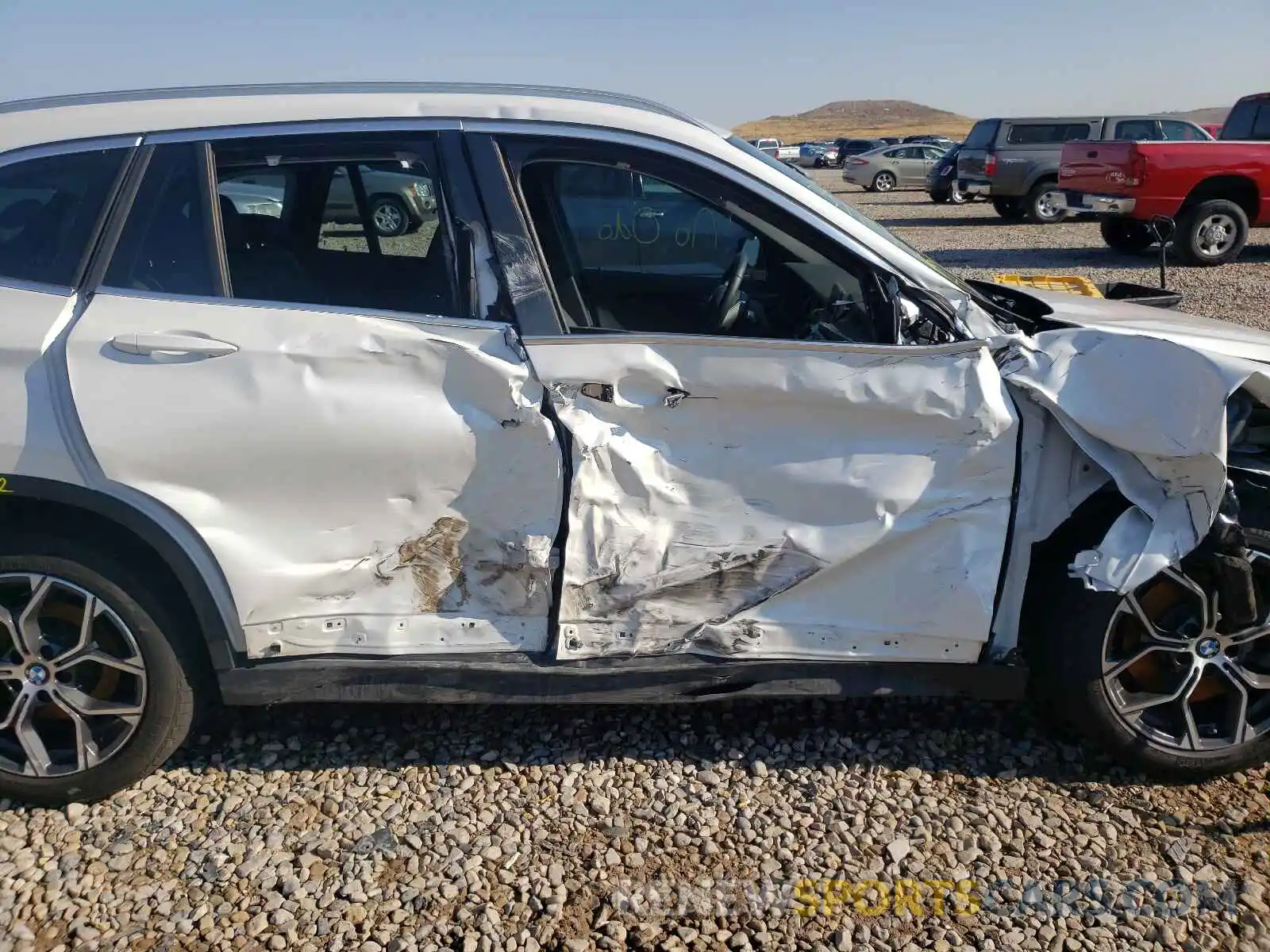 9 Photograph of a damaged car WBXJG9C04M5S30328 BMW X1 2021