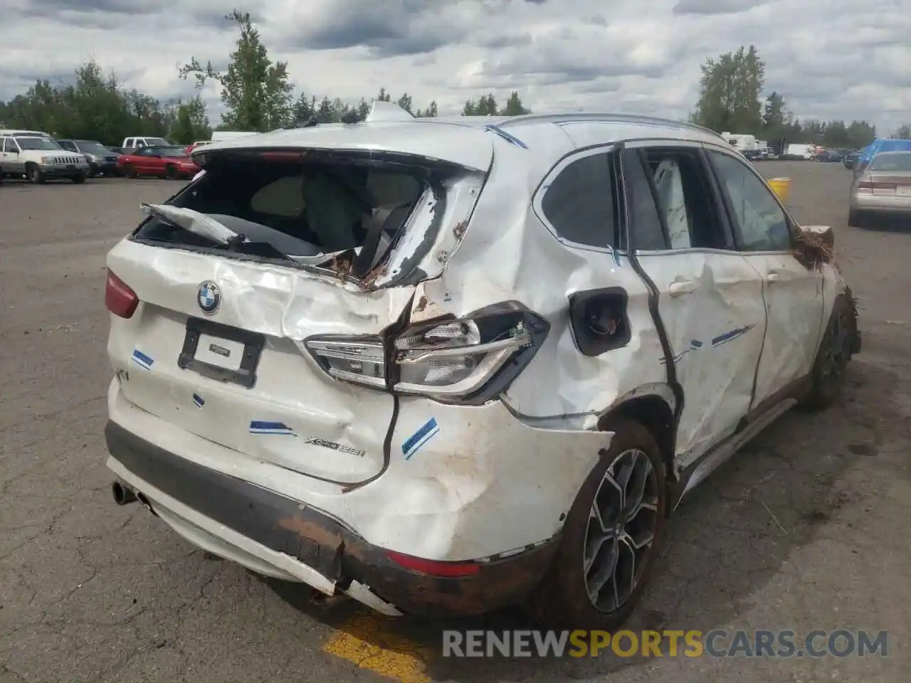 4 Photograph of a damaged car WBXJG9C06M5T99587 BMW X1 2021