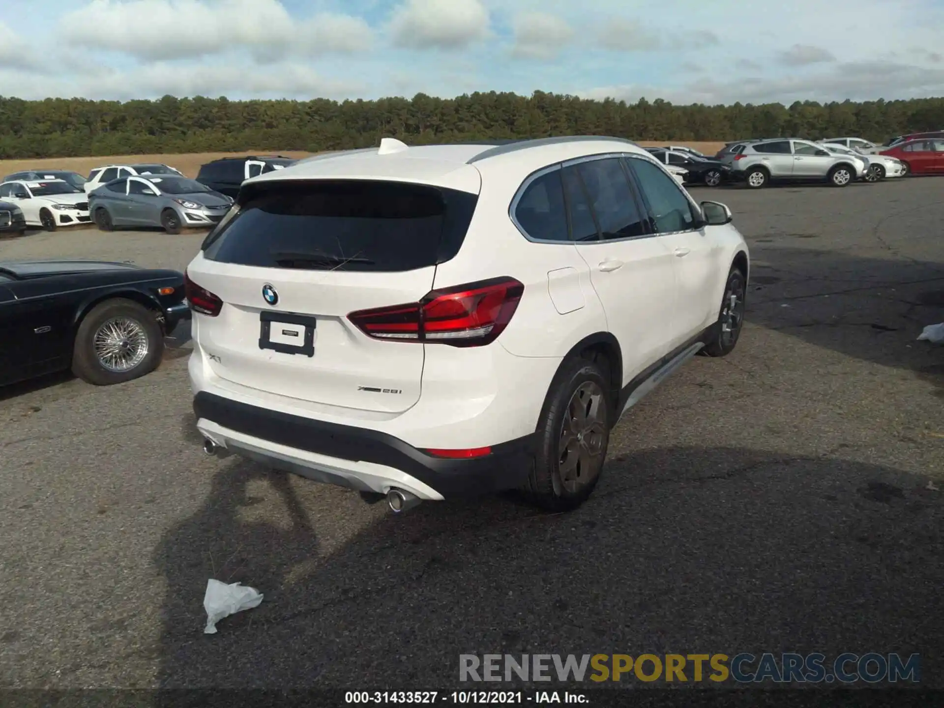 4 Photograph of a damaged car WBXJG9C08M5T73279 BMW X1 2021