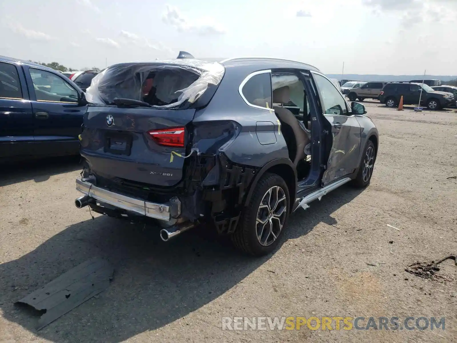 4 Photograph of a damaged car WBXJG9C0XM5T64938 BMW X1 2021