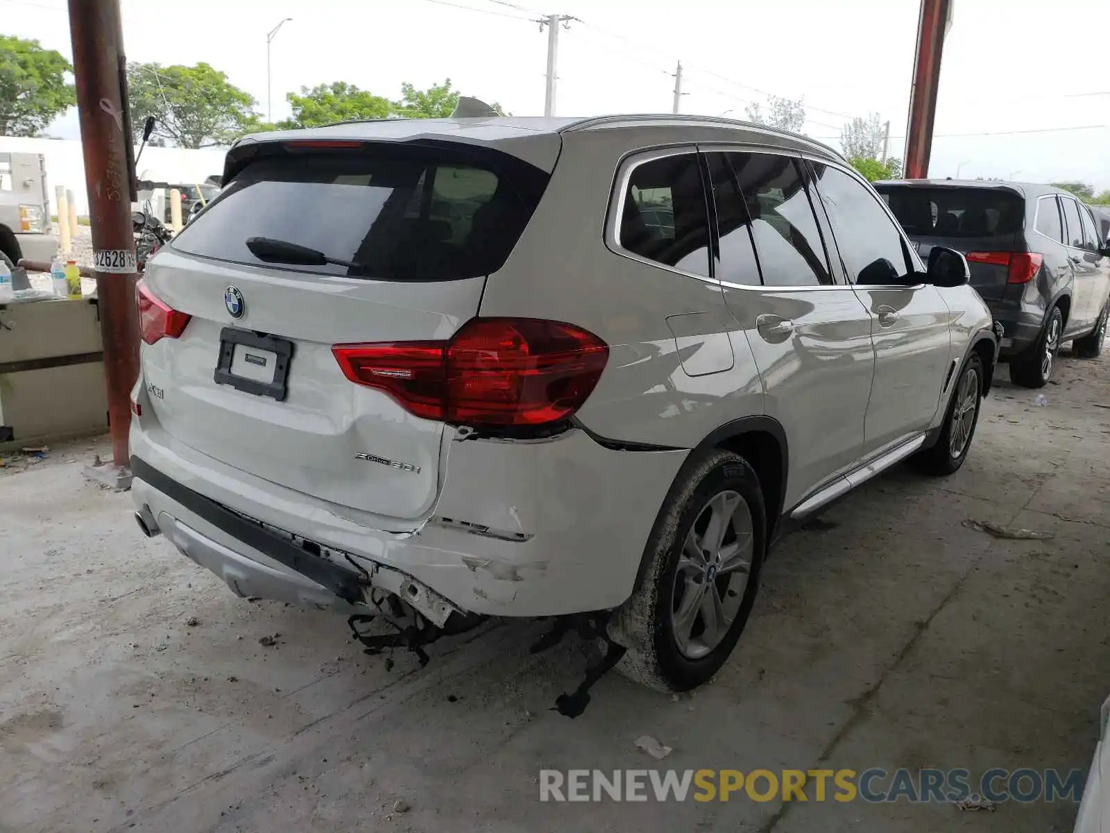 4 Photograph of a damaged car 5UXTR7C50KLF26876 BMW X3 2019