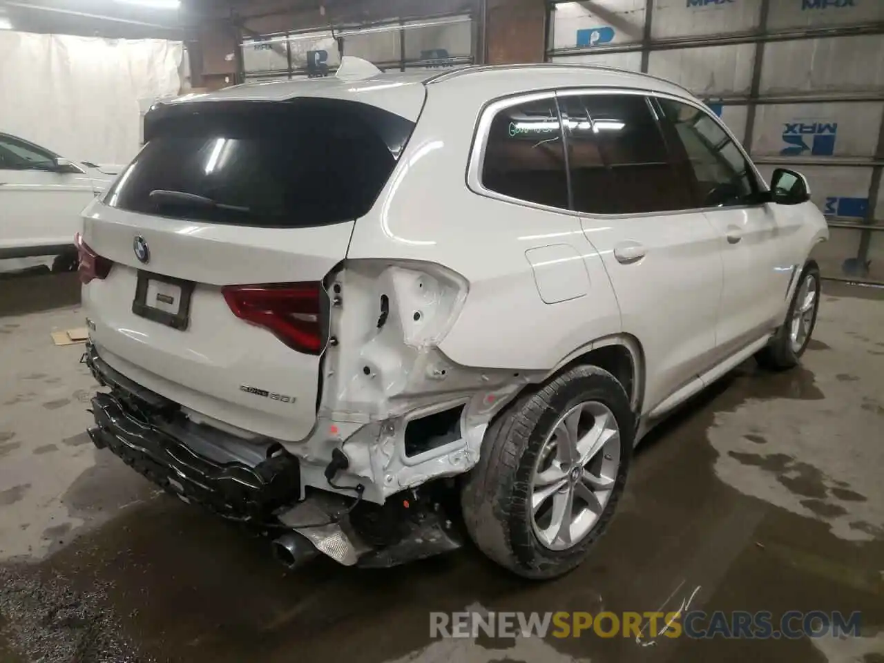 4 Photograph of a damaged car 5UXTR7C50KLR44075 BMW X3 2019