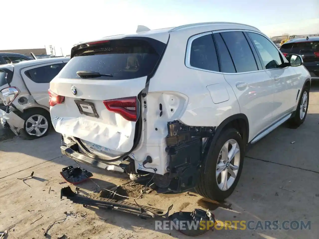 4 Photograph of a damaged car 5UXTR7C50KLR47588 BMW X3 2019