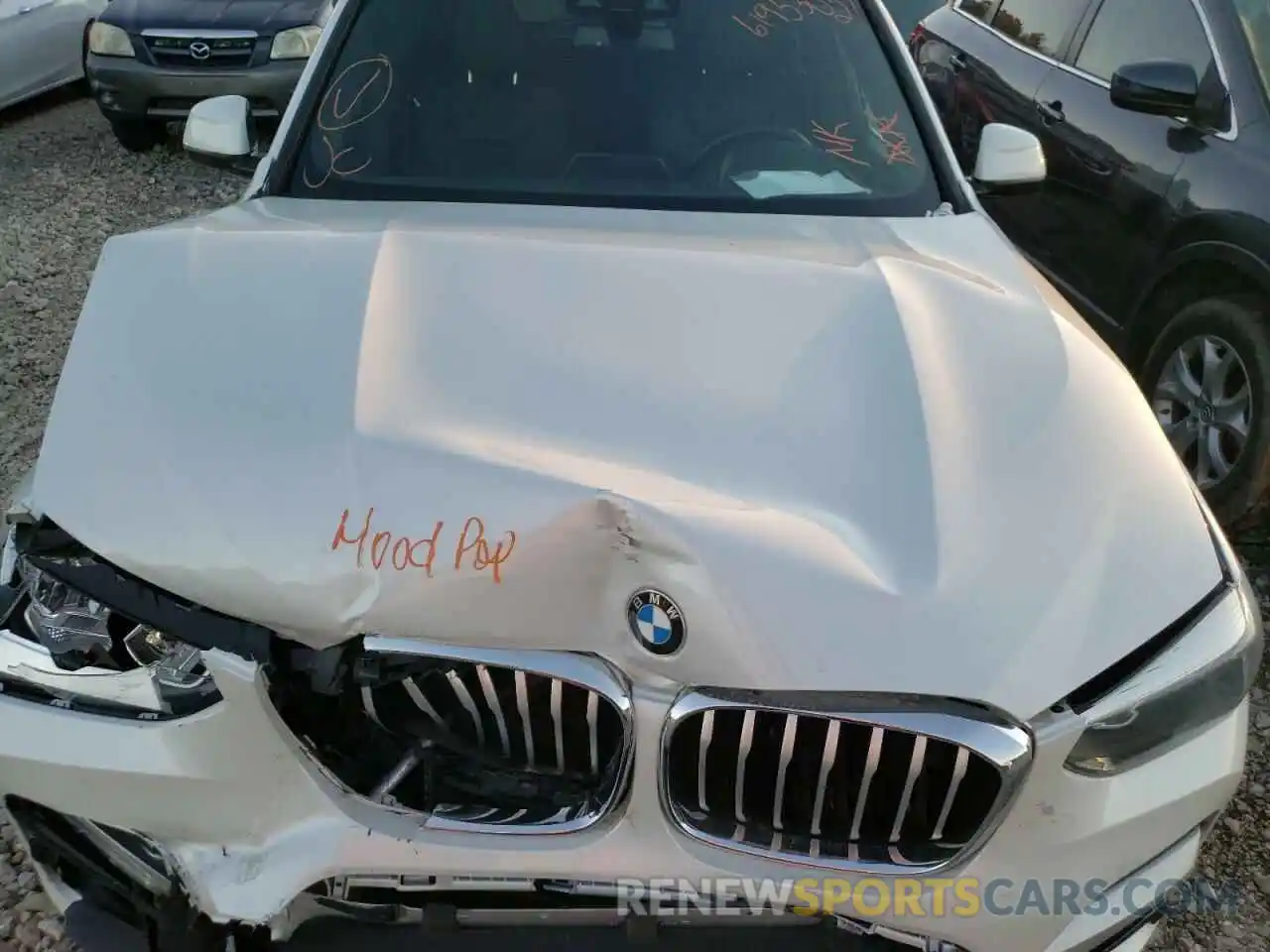 7 Photograph of a damaged car 5UXTR7C51KLE98702 BMW X3 2019