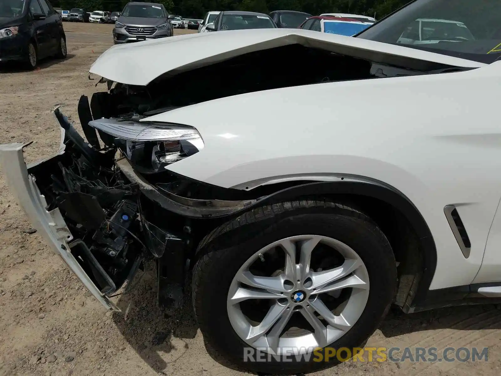 9 Photograph of a damaged car 5UXTR7C51KLF25008 BMW X3 2019