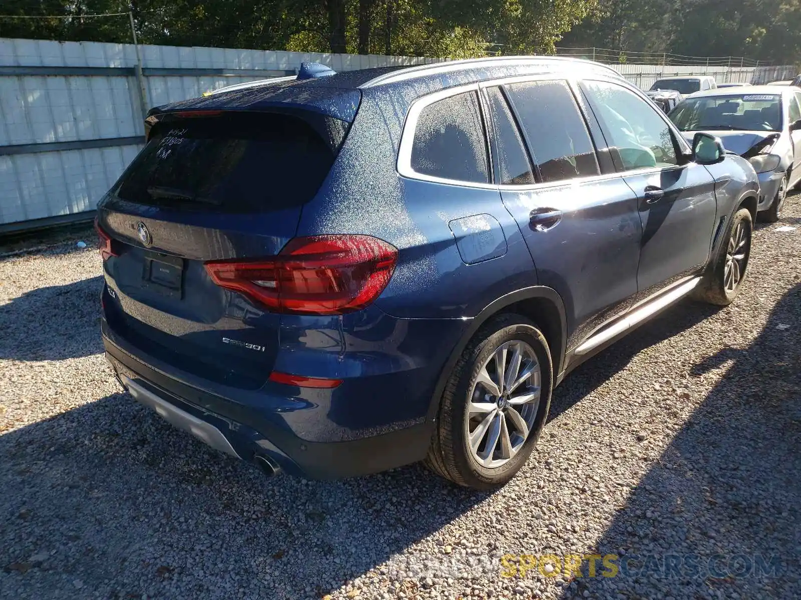 4 Photograph of a damaged car 5UXTR7C51KLF33805 BMW X3 2019