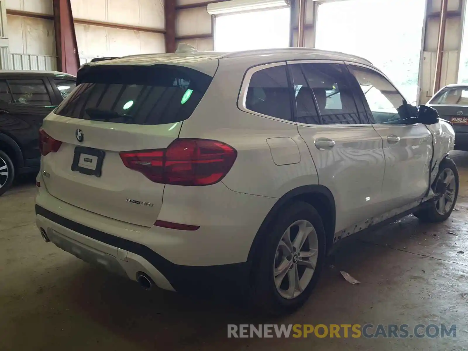 4 Photograph of a damaged car 5UXTR7C51KLF35618 BMW X3 2019