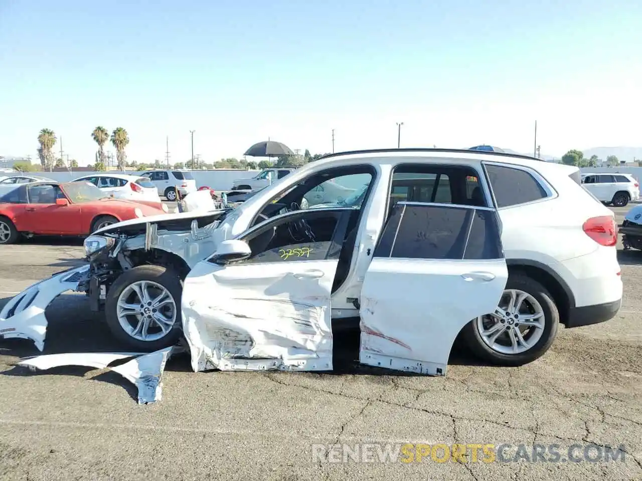 9 Photograph of a damaged car 5UXTR7C52KLE98109 BMW X3 2019