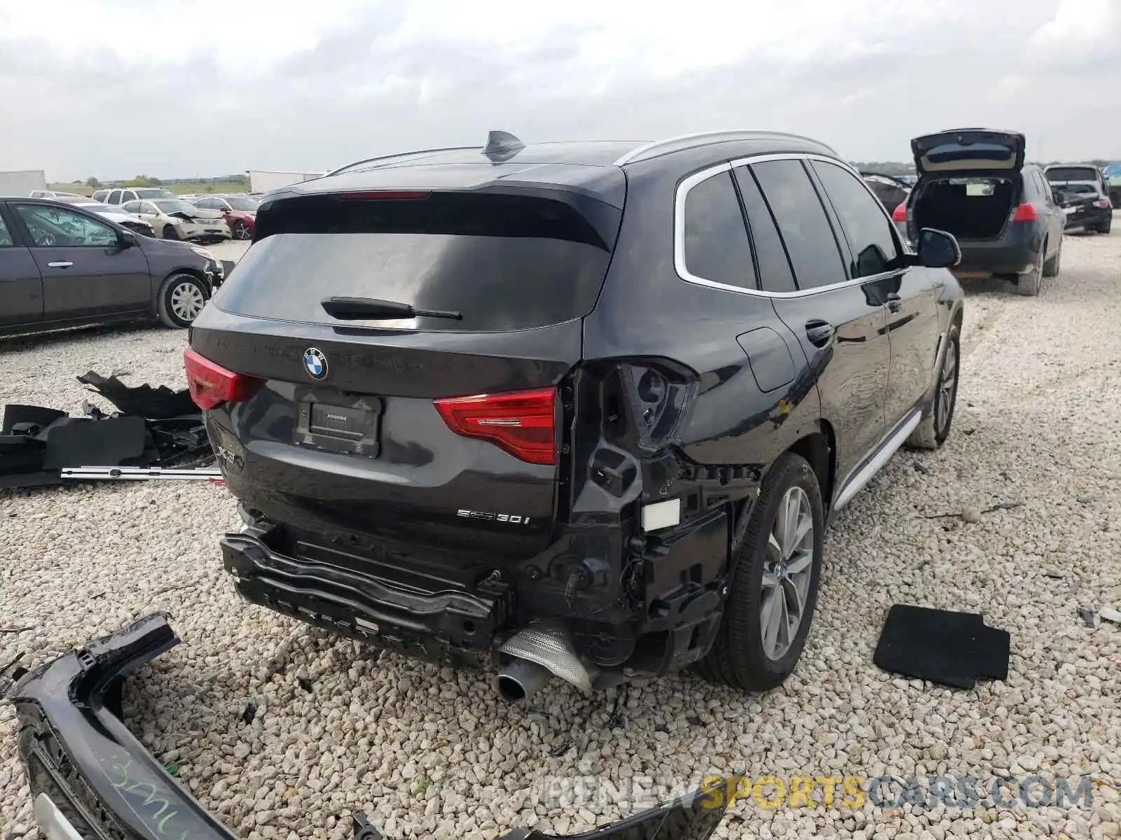 4 Photograph of a damaged car 5UXTR7C52KLF32291 BMW X3 2019