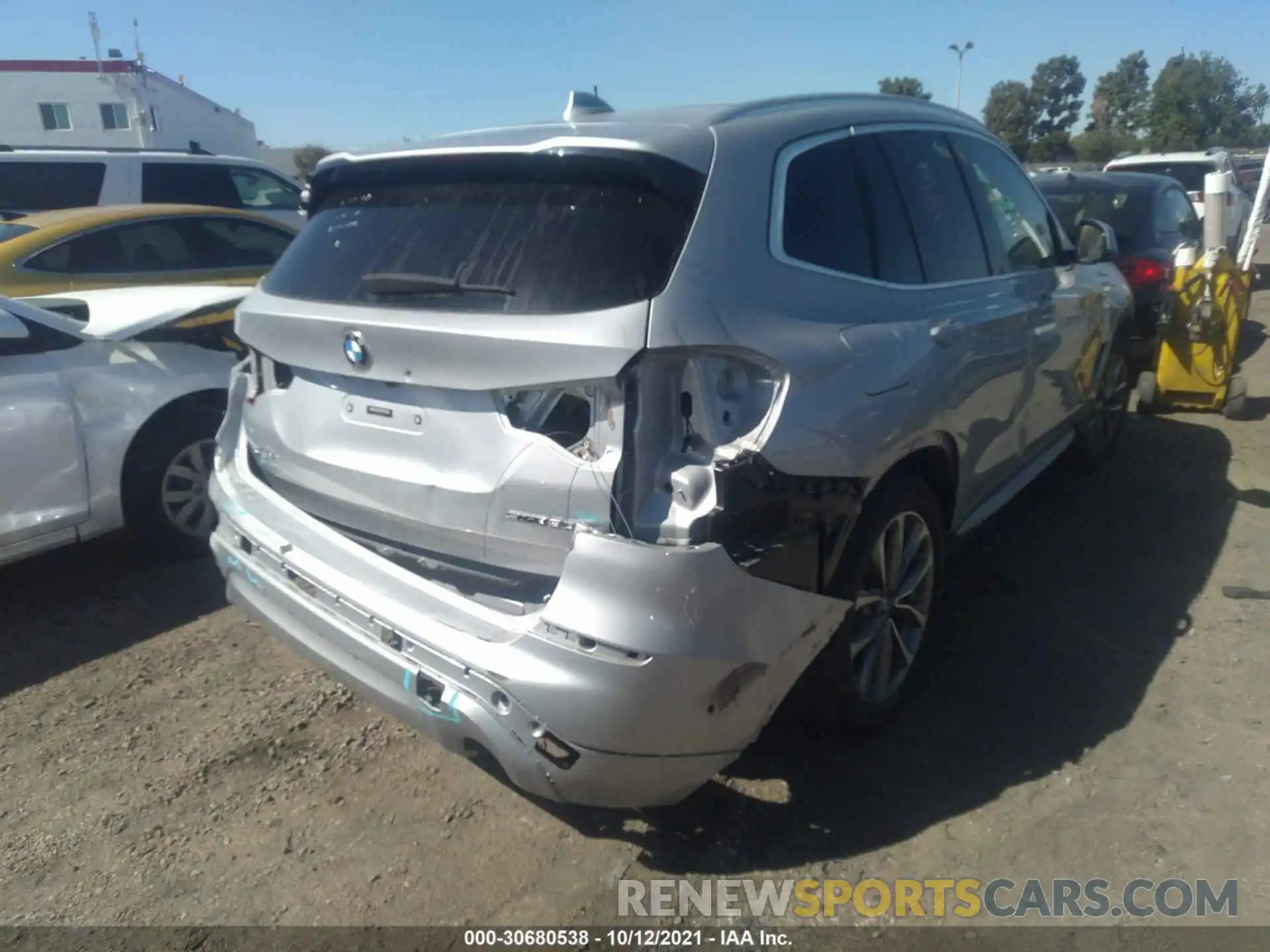 4 Photograph of a damaged car 5UXTR7C52KLR45406 BMW X3 2019