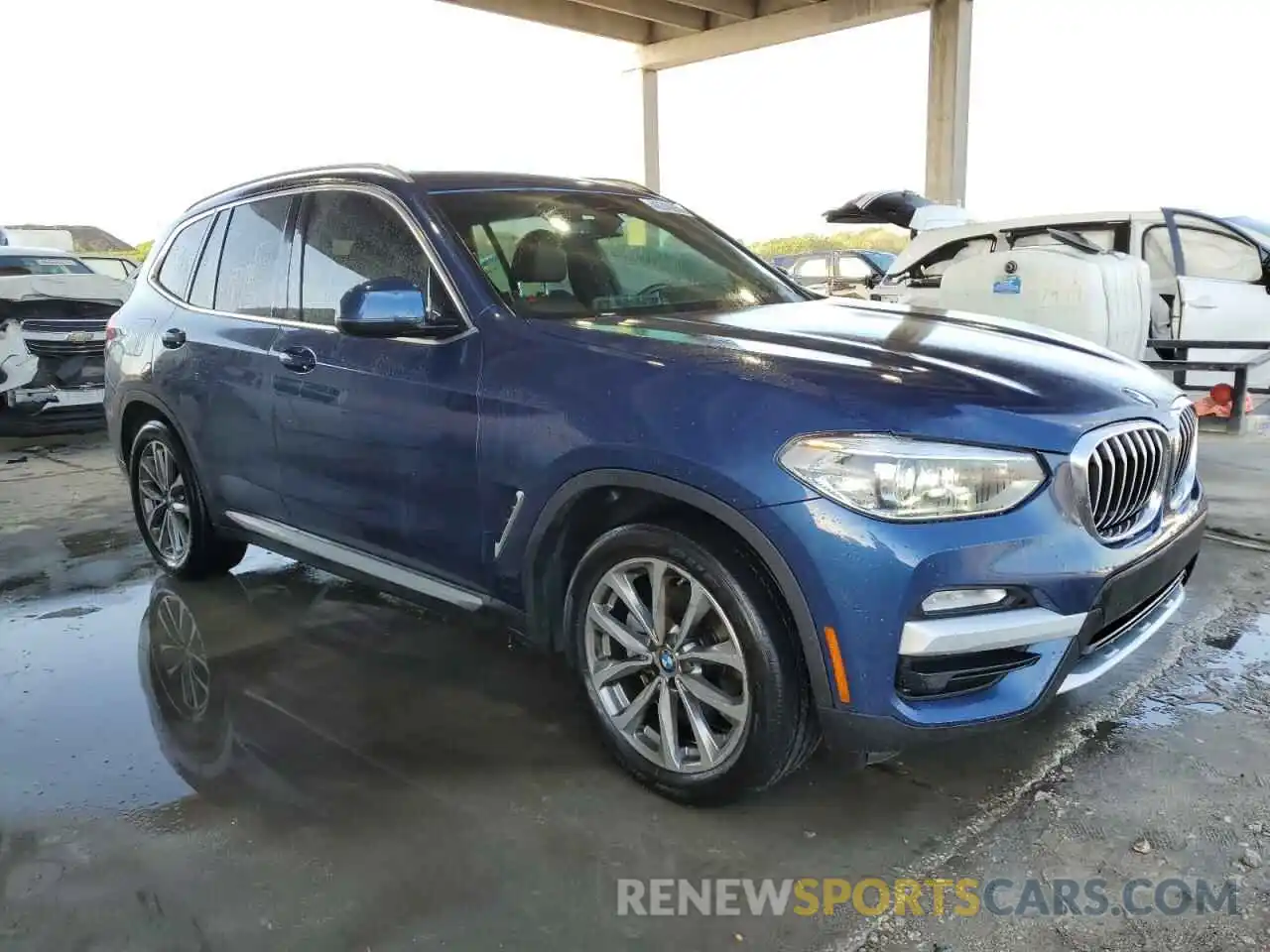 4 Photograph of a damaged car 5UXTR7C54KLF29974 BMW X3 2019