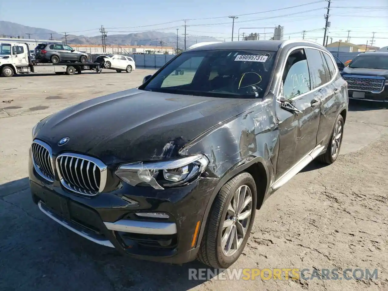 2 Photograph of a damaged car 5UXTR7C54KLF35922 BMW X3 2019