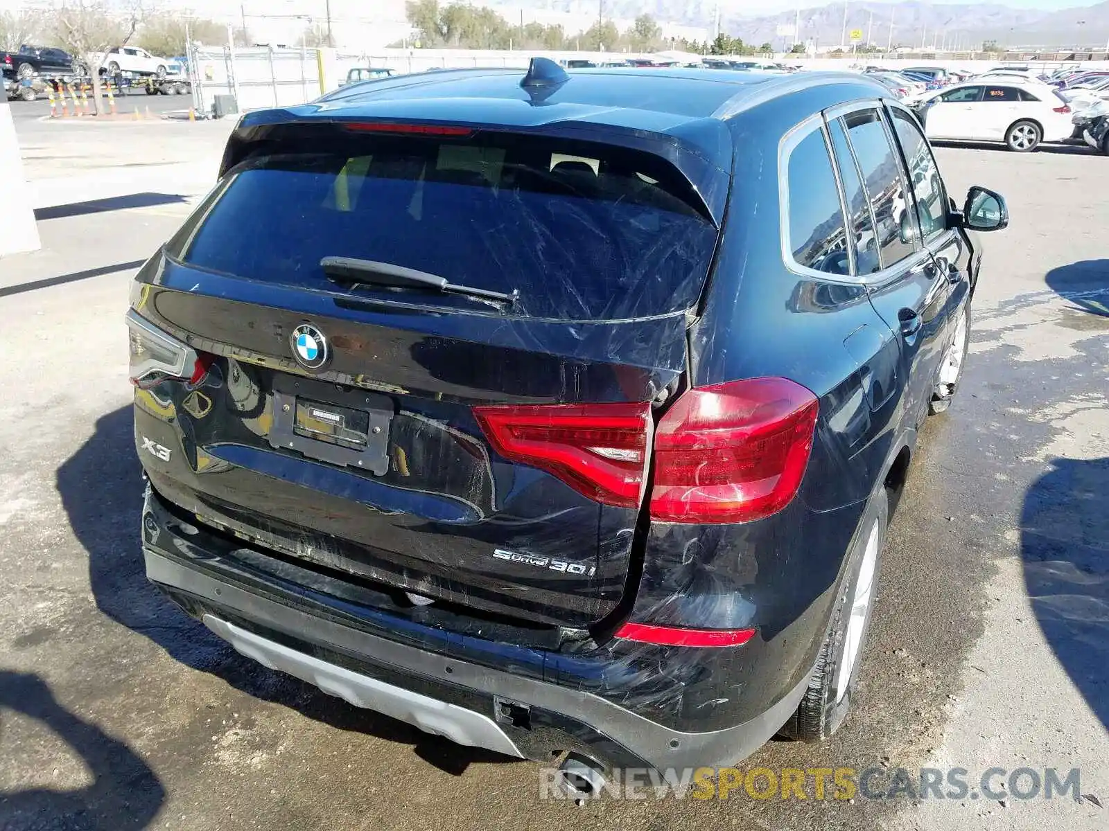 4 Photograph of a damaged car 5UXTR7C54KLR43673 BMW X3 2019