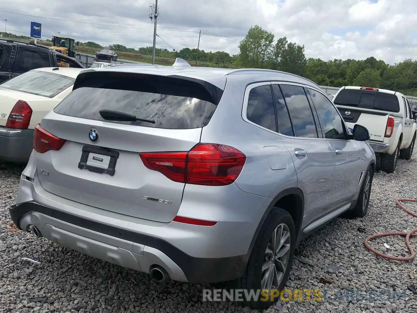 4 Photograph of a damaged car 5UXTR7C54KLR46492 BMW X3 2019