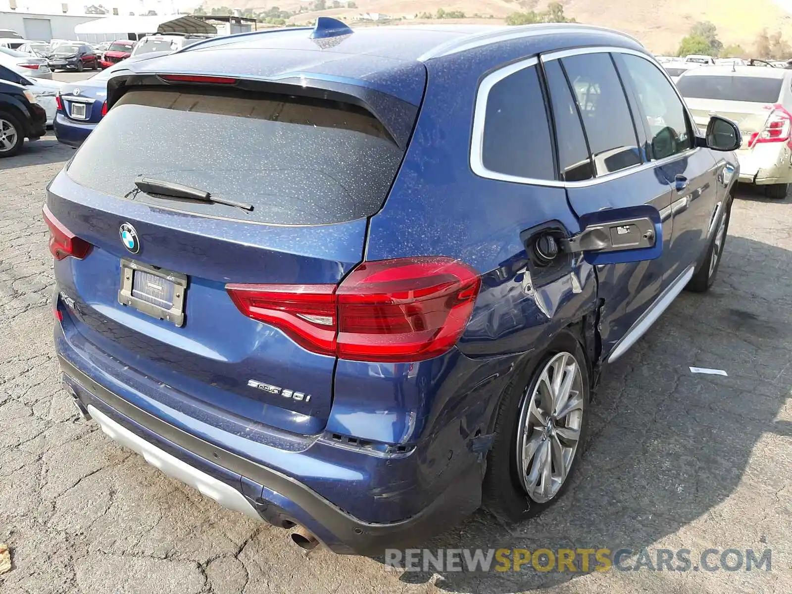 4 Photograph of a damaged car 5UXTR7C55KLE97620 BMW X3 2019