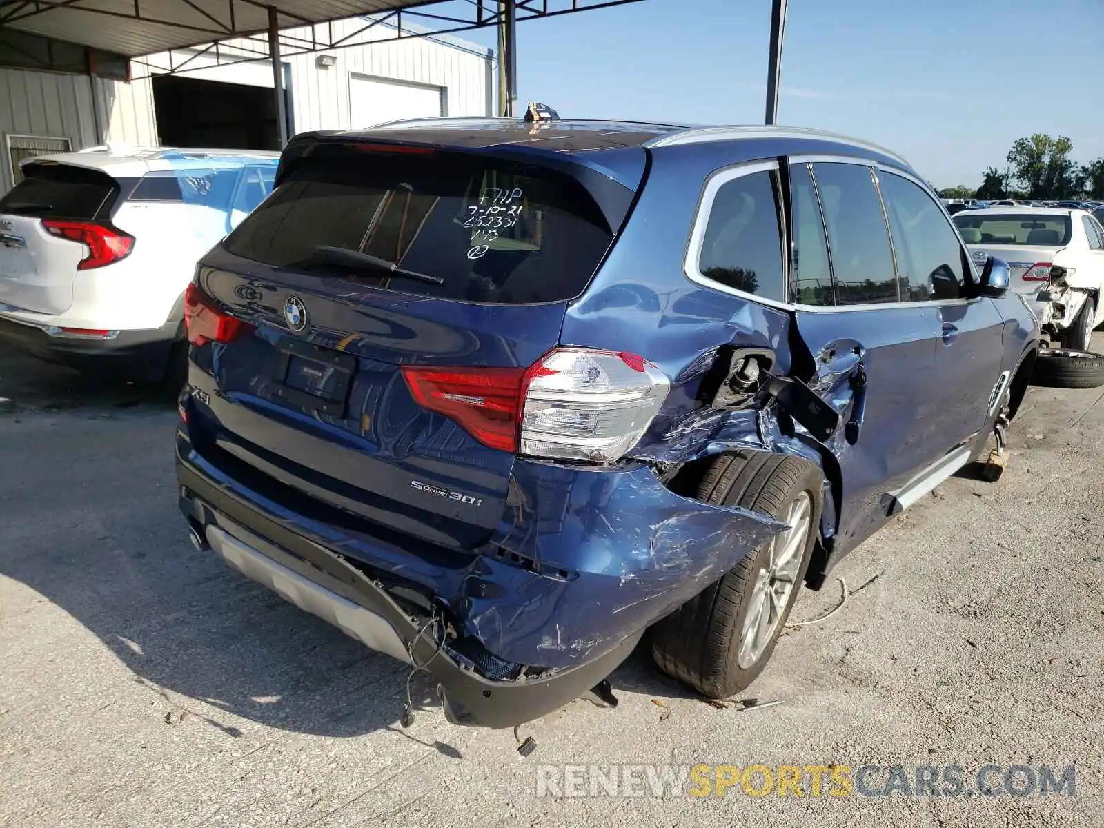 4 Photograph of a damaged car 5UXTR7C55KLR45898 BMW X3 2019