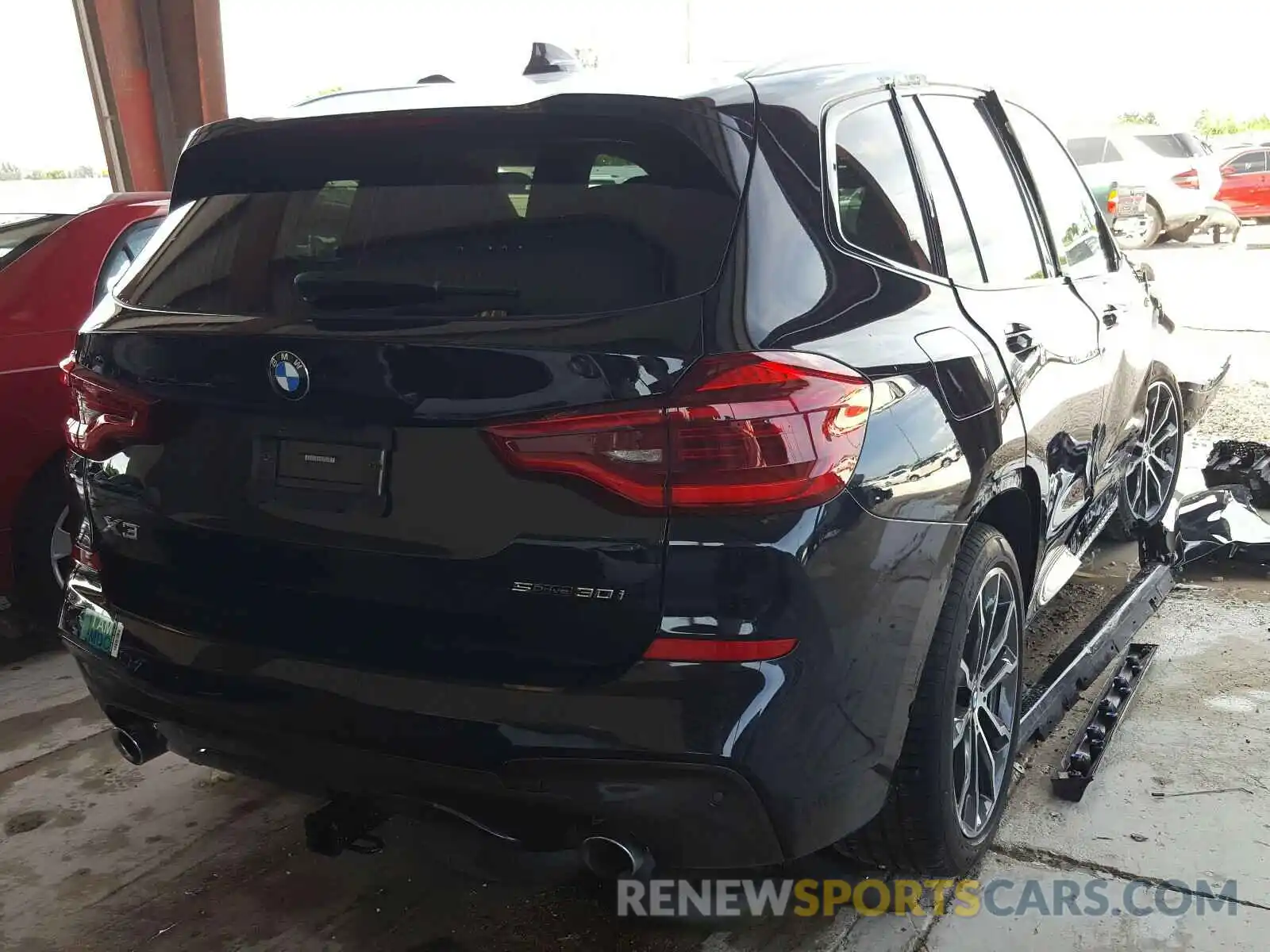 4 Photograph of a damaged car 5UXTR7C55KLR50129 BMW X3 2019