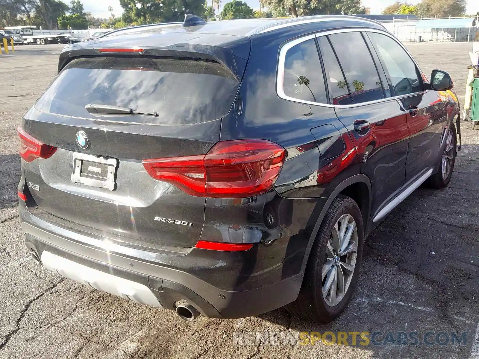 4 Photograph of a damaged car 5UXTR7C57KLE96453 BMW X3 2019