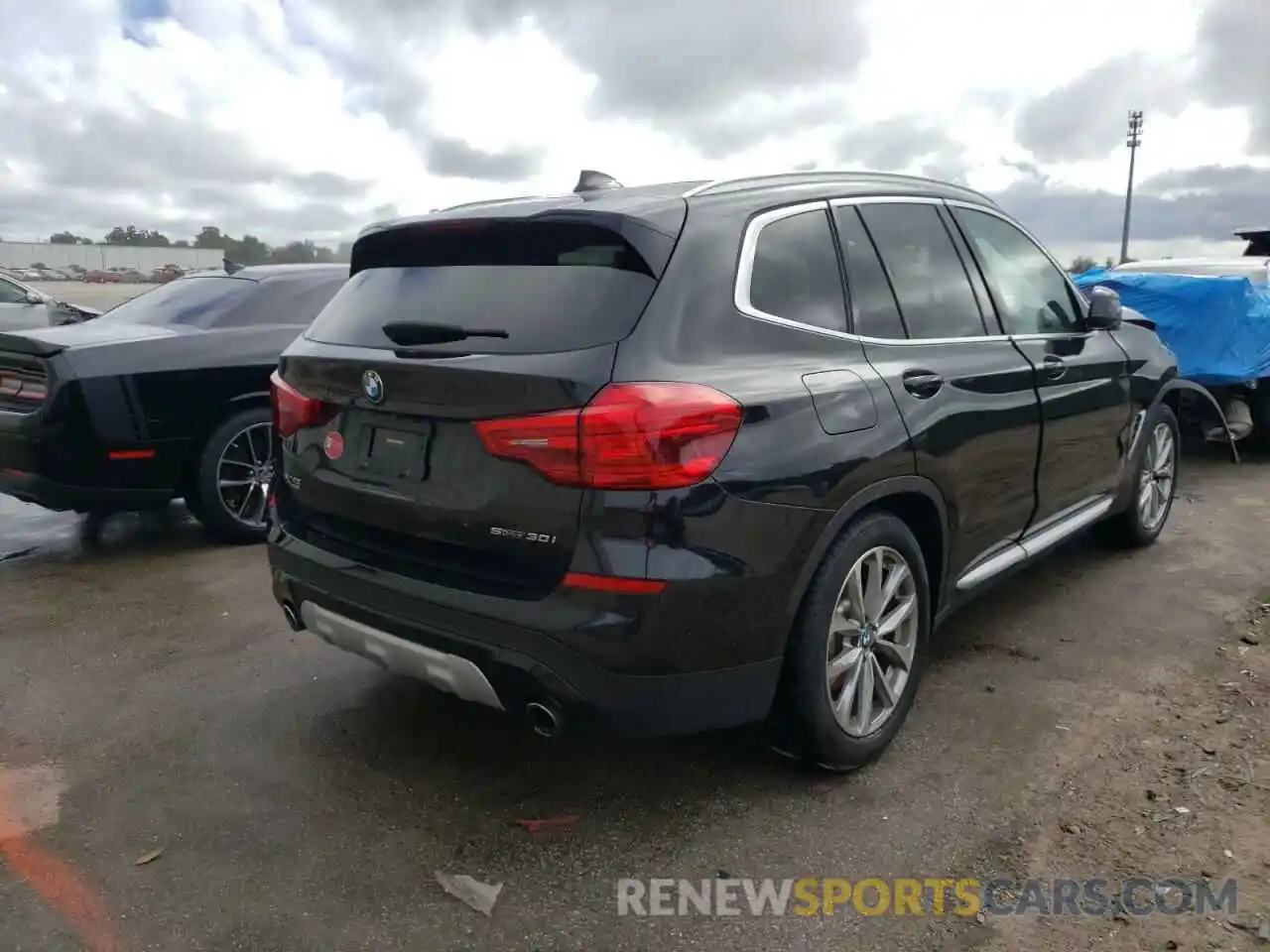 4 Photograph of a damaged car 5UXTR7C57KLE97814 BMW X3 2019