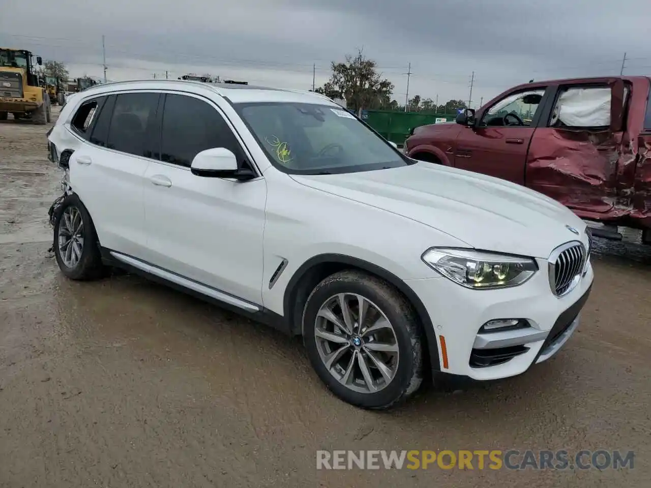 4 Photograph of a damaged car 5UXTR7C57KLF37356 BMW X3 2019