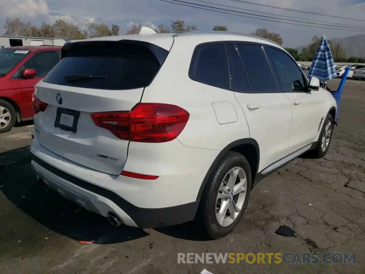 4 Photograph of a damaged car 5UXTR7C57KLR47314 BMW X3 2019