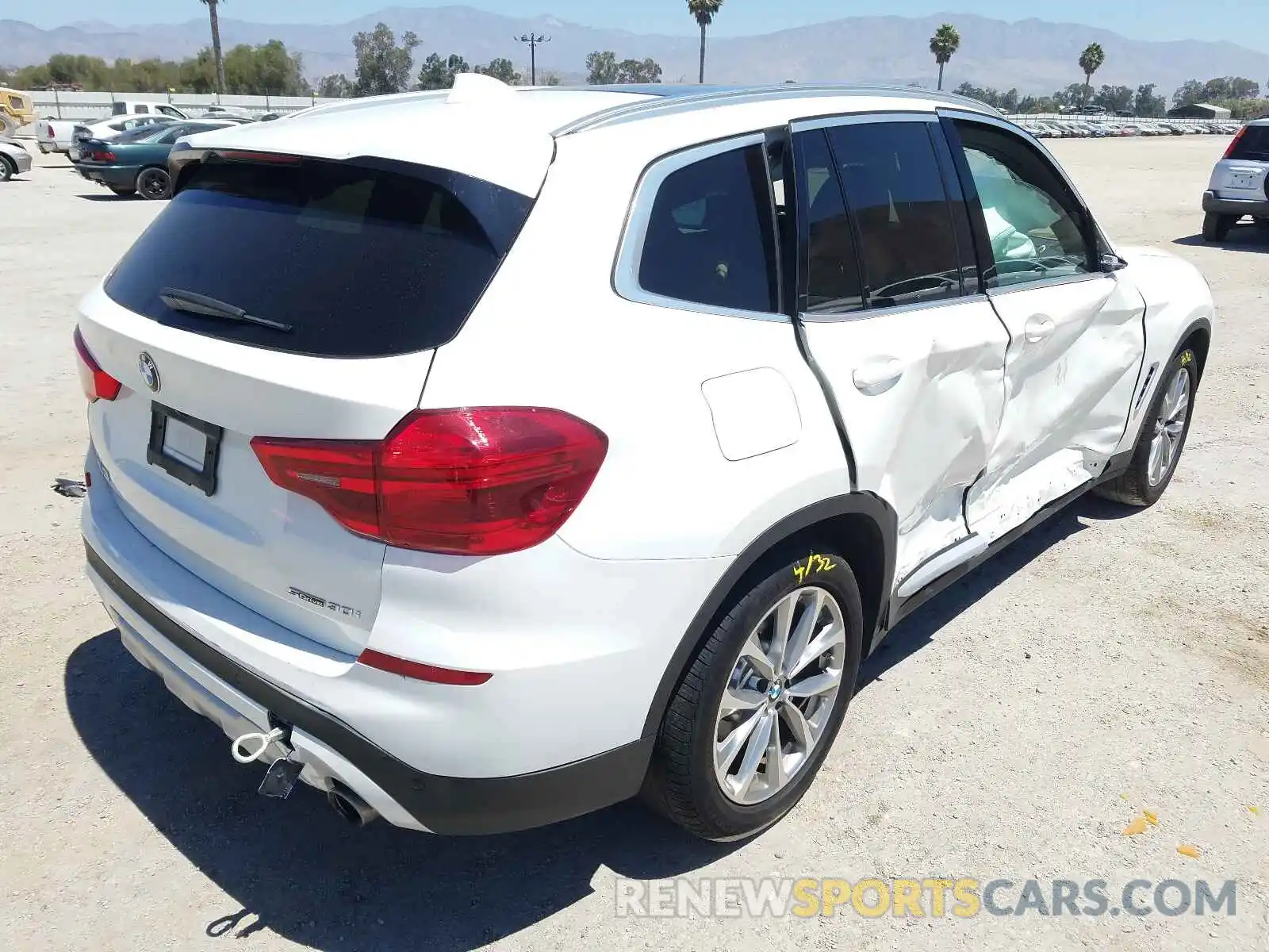 4 Photograph of a damaged car 5UXTR7C58KLF34921 BMW X3 2019