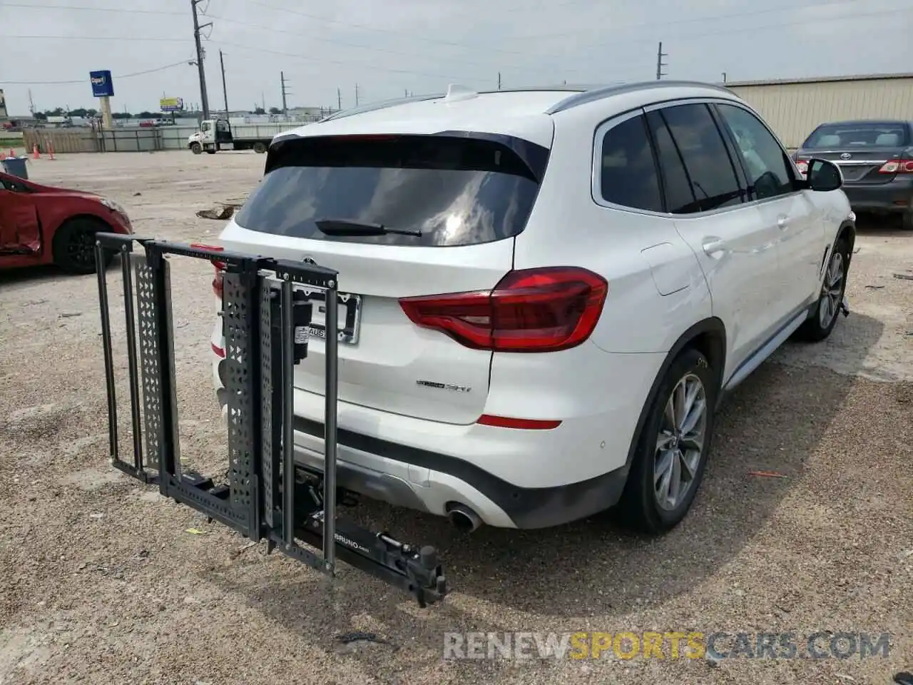 4 Photograph of a damaged car 5UXTR7C58KLR52697 BMW X3 2019