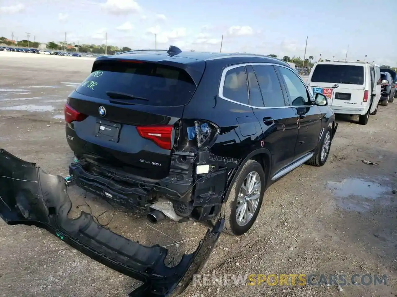 4 Photograph of a damaged car 5UXTR7C59KLF31493 BMW X3 2019