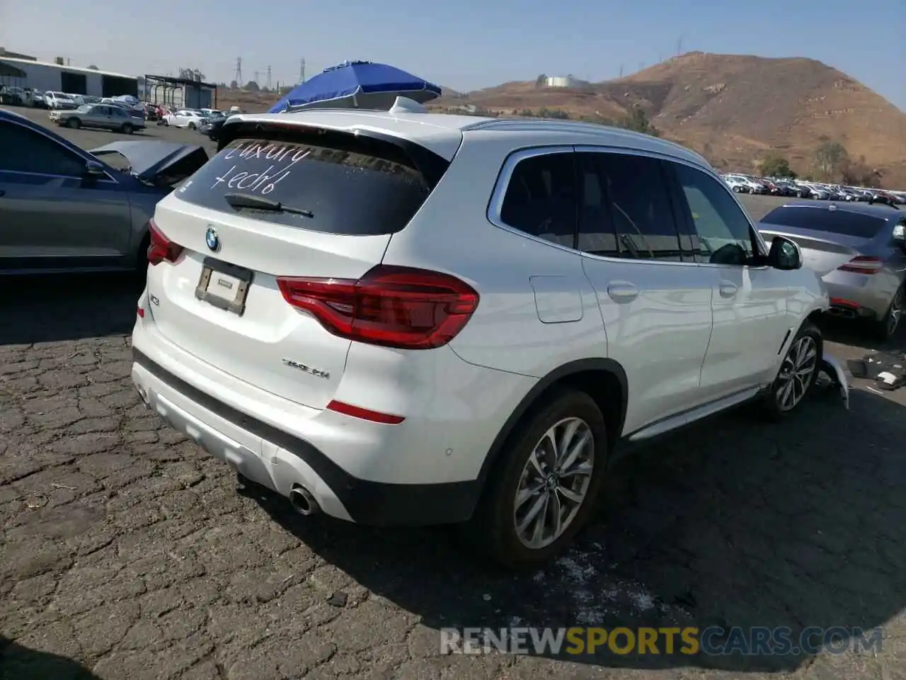 4 Photograph of a damaged car 5UXTR7C59KLF35396 BMW X3 2019