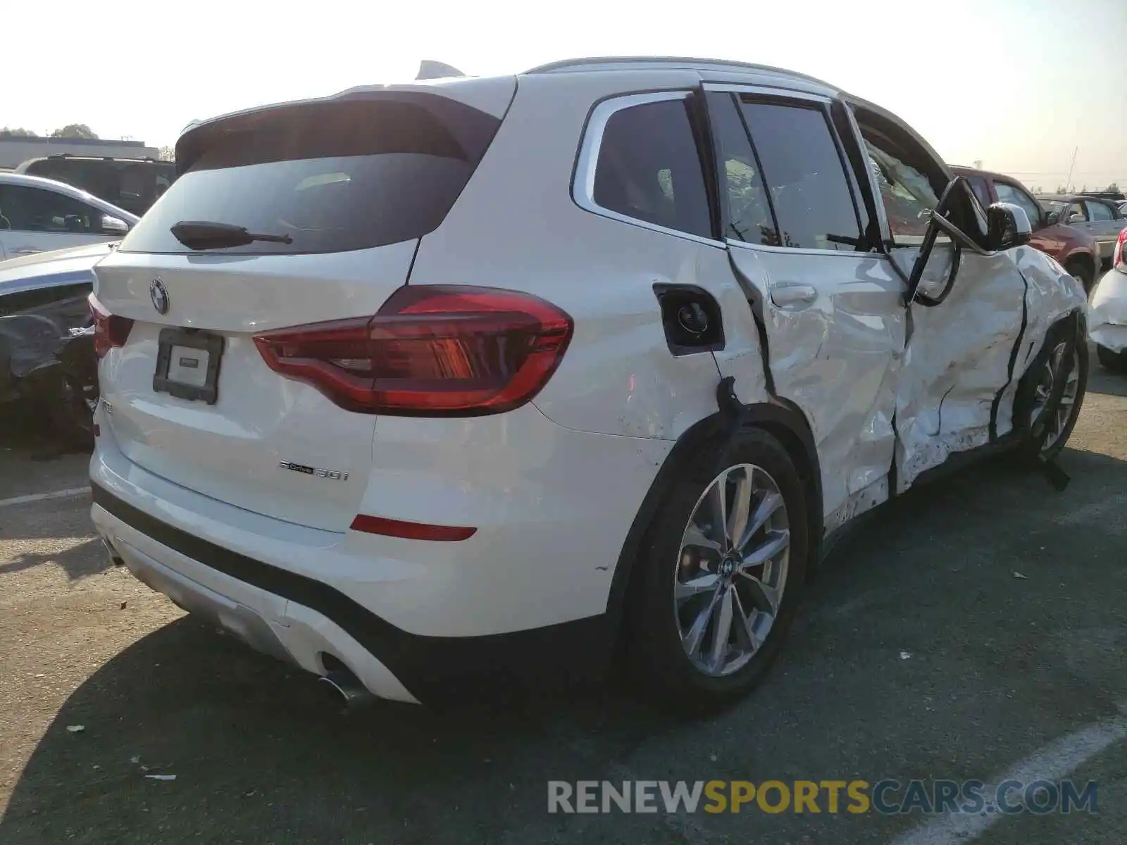 4 Photograph of a damaged car 5UXTR7C5XKLE96348 BMW X3 2019