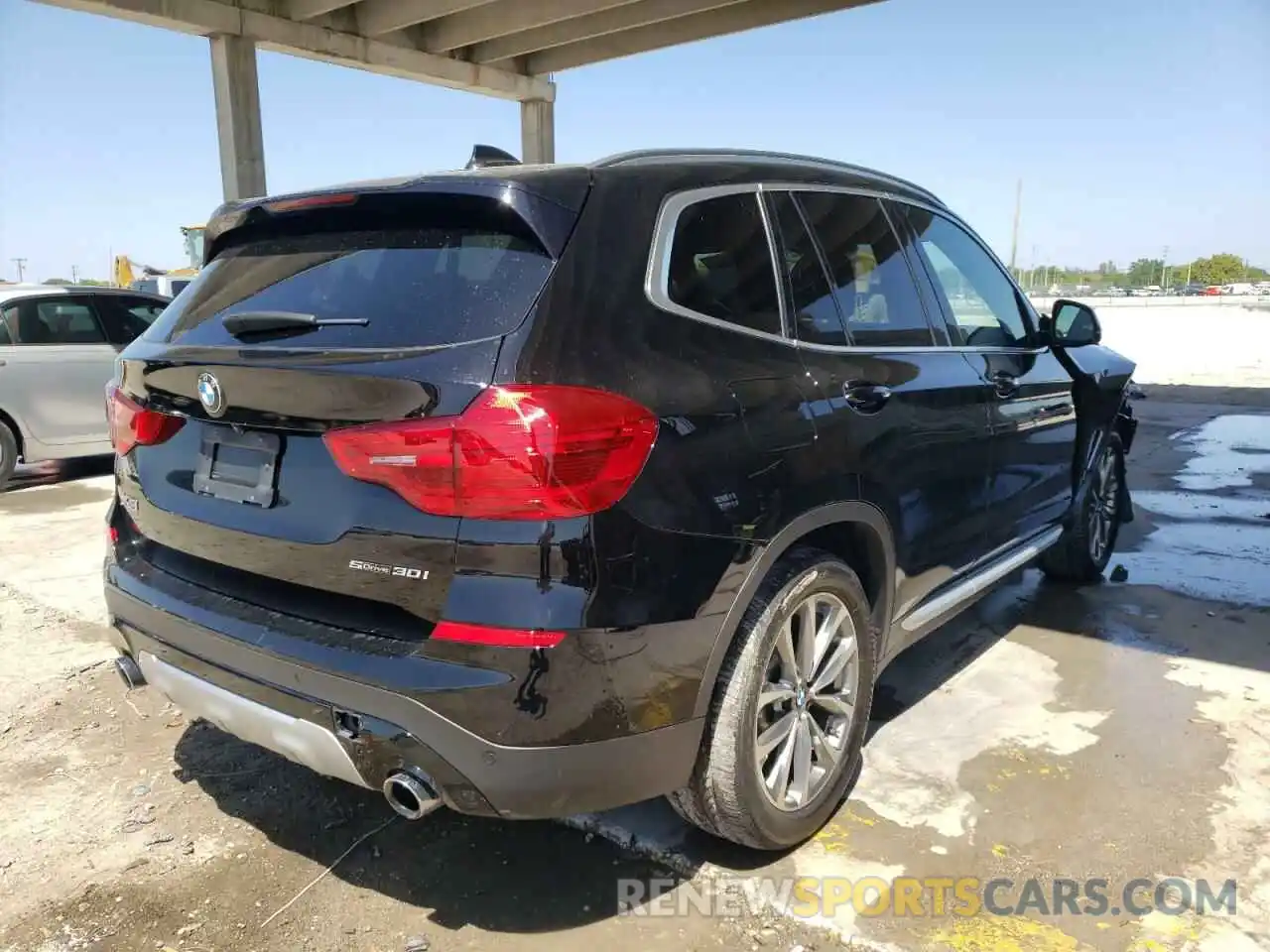 4 Photograph of a damaged car 5UXTR7C5XKLE97287 BMW X3 2019