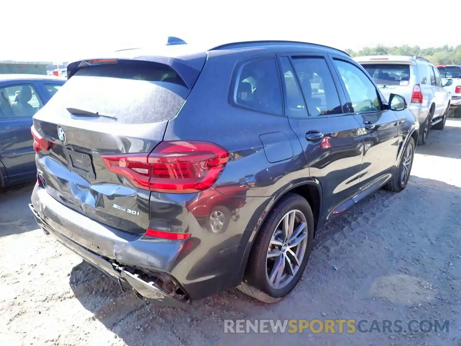 4 Photograph of a damaged car 5UXTR7C5XKLF23712 BMW X3 2019