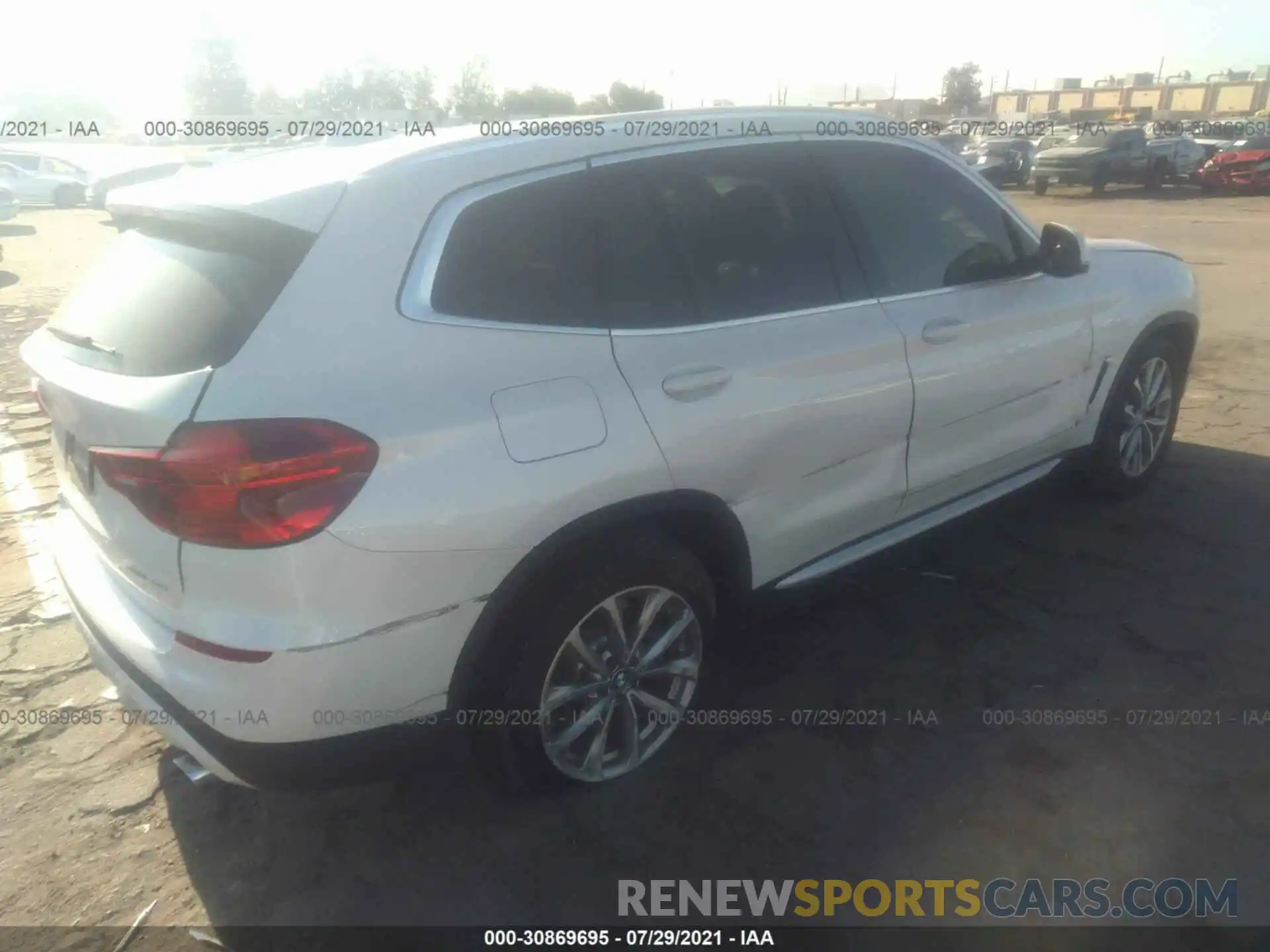 4 Photograph of a damaged car 5UXTR7C5XKLF23743 BMW X3 2019