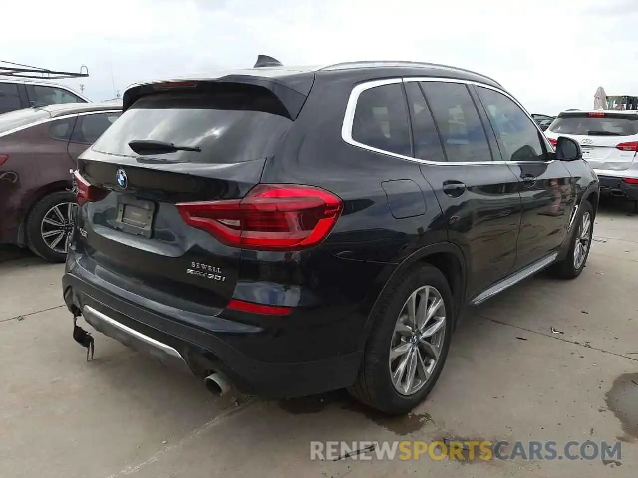 4 Photograph of a damaged car 5UXTR7C5XKLF23905 BMW X3 2019